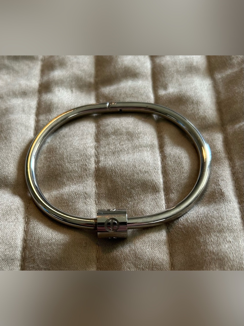 Silver Oval Hinged Bracelet with Signature Logo